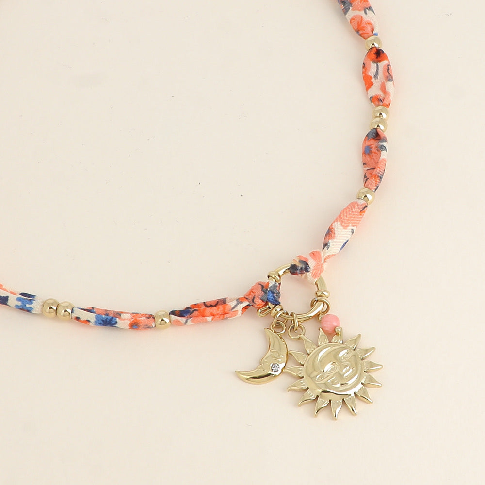CORAIL - Collier breloque éléments du soleil